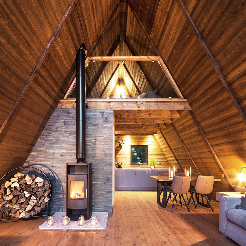 A-Frame garden building interior taken at dusk