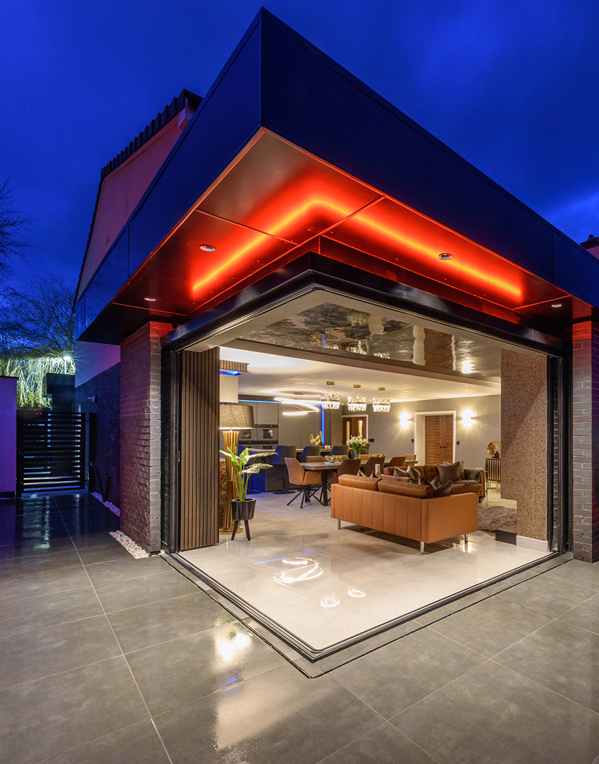 Residential architectural detail of open plan living room at dusk