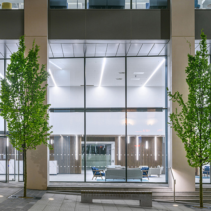 Modern office building exterior of Bank House in Newcastle taken from the street looking into the reception interior