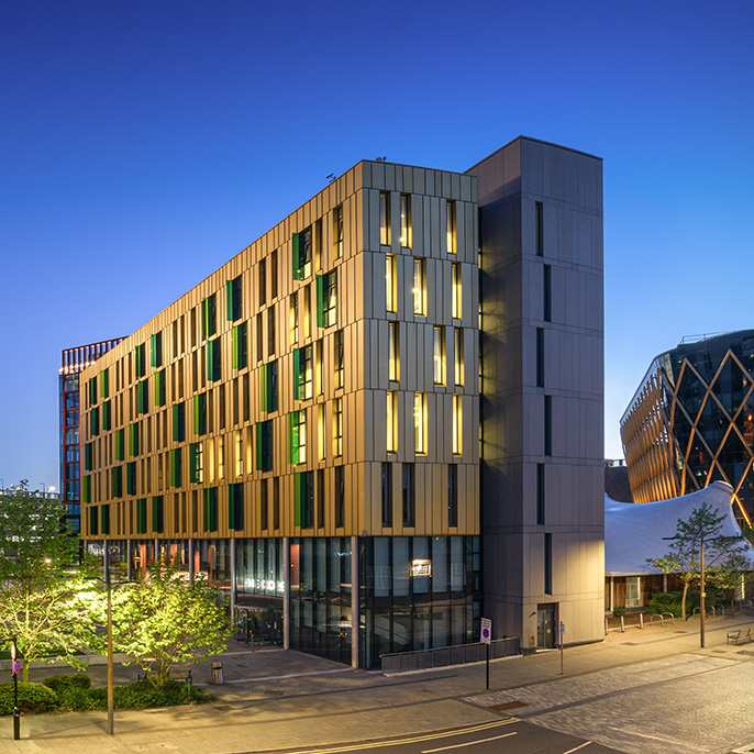 Elevated view of Newcastle Helix and The Core Building at dusk 