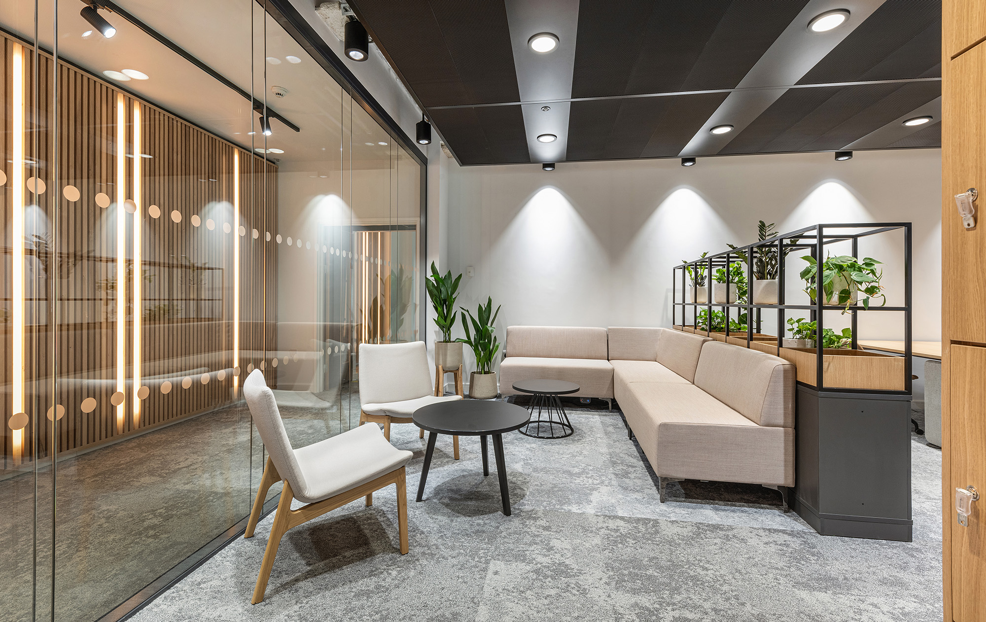 Office interor with seating and glass partition wall