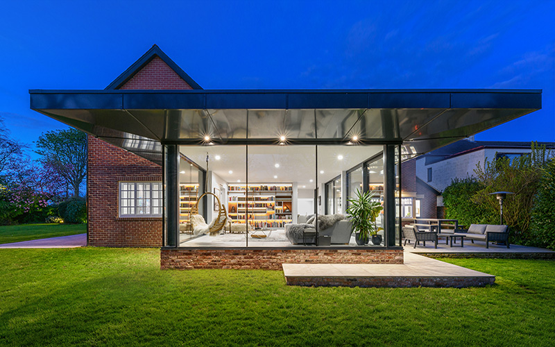 Architectural exterior of a residential property at dusk