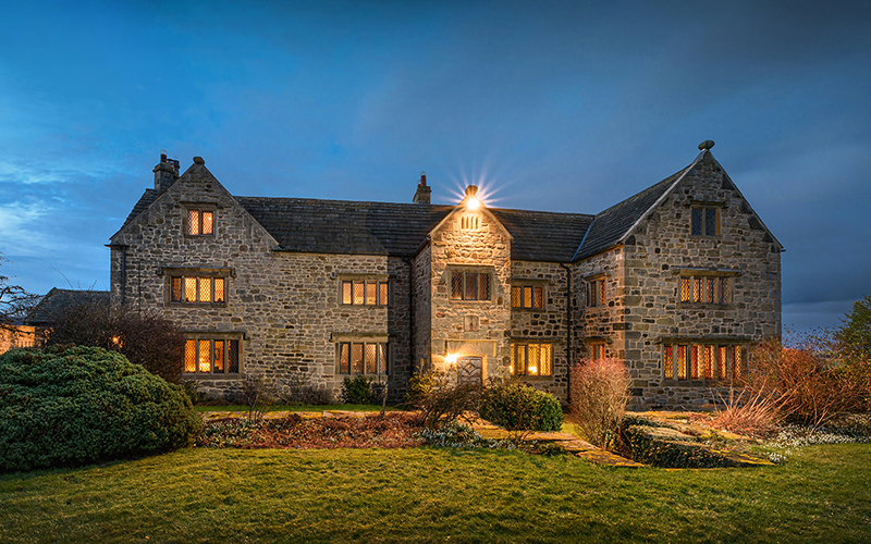 Architectural exterior of a period property at dusk