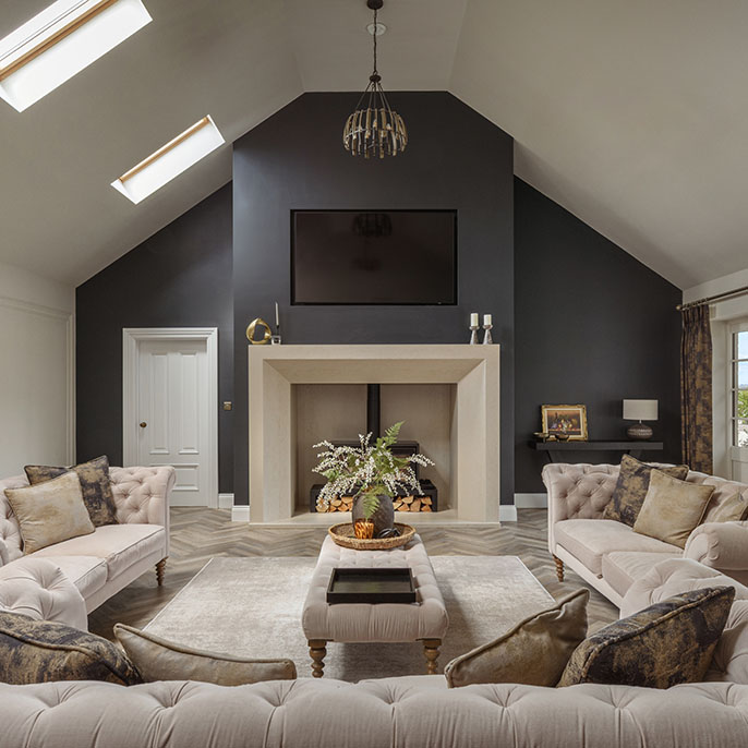 Interior of a residential property with fireplace and furniture